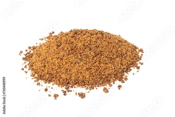 Obraz Granulated Sugarcane Jaggery or Indian Gur Isolated on White Background with Copy Space