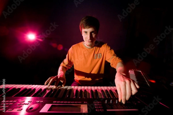 Fototapeta Musician play on the keyboard synthesizer