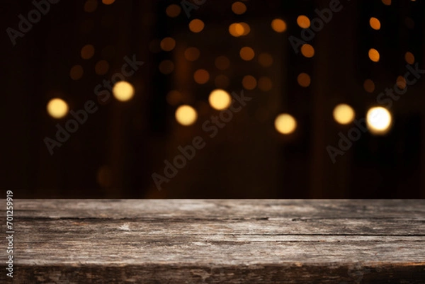 Obraz image of a wooden table on a blurred bokeh background