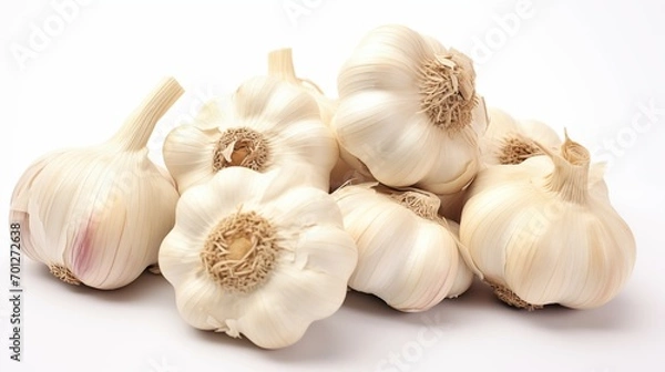 Fototapeta Healthy diet. Vegetables. A handful of garlic on white background. Isolated
