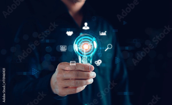 Fototapeta Digital marketing solution communication and Global Internet network connection concept. Businessman holding light bulb, Application smartphone, Sales Strategy, big data, Research finance analyst.