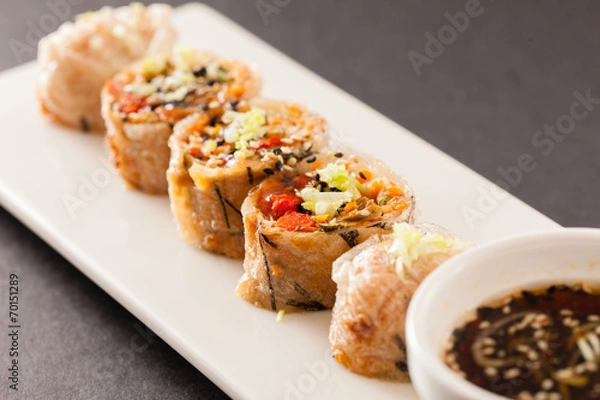 Fototapeta spring rolls with soy sauce