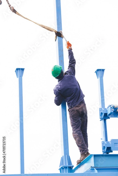 Obraz Manual worker working at shipyard construction site