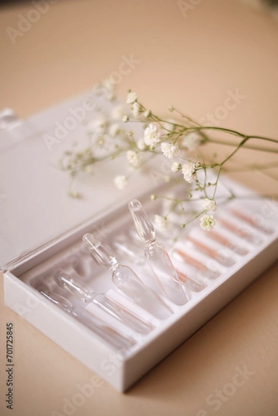 Obraz Cosmetic ampoules in a box