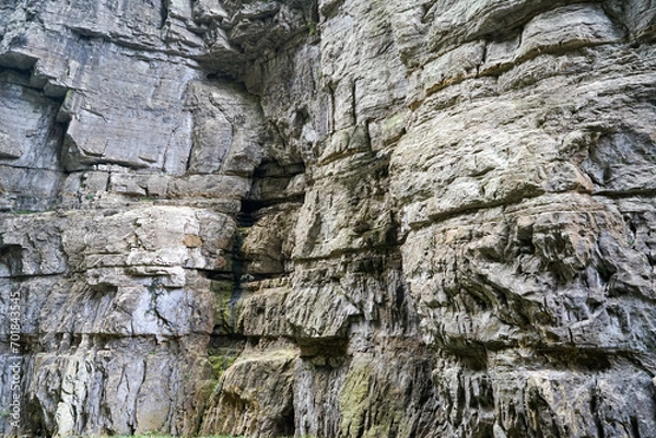 Fototapeta Karst terrain, rough mineral rocks formed by wind erosion are uneven. The Three Natural Bridges are a series of natural limestone bridges, Chongqing.