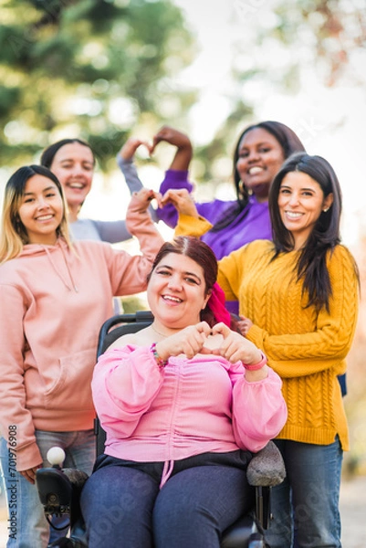 Fototapeta Inspire Inclusion international womens day. Diverse group do heart love with hands. Disability 