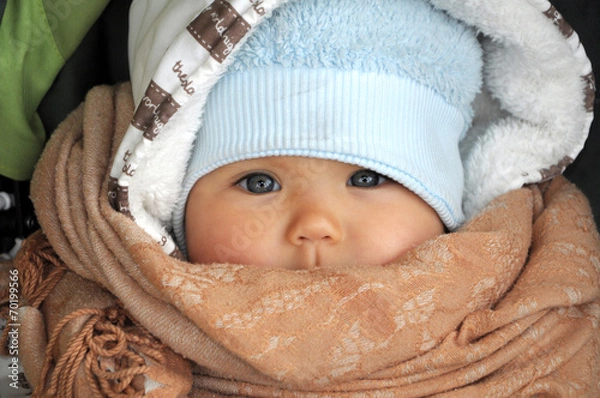 Obraz Baby in warm clothes in cold weather