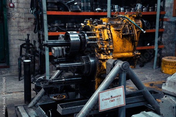 Obraz the transmission of the bulldozer on the repair stand