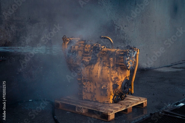 Obraz Caterpillar dump truck engine at the washing