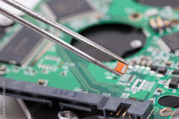 Obraz worker repair green harddisk pcb