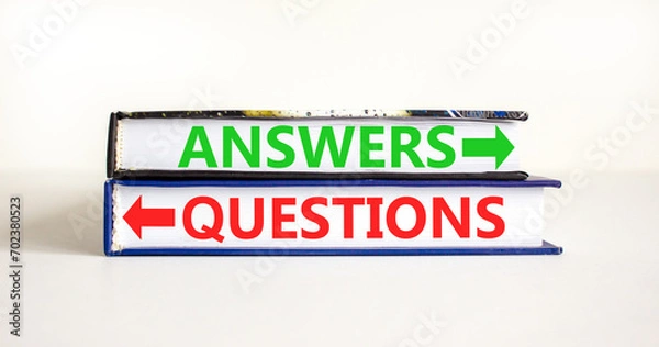 Fototapeta Questions and answers symbol. Concept word Questions Answers on beautiful books. Beautiful white table white background. Business questions and answers concept. Copy space.