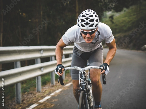 Fototapeta Cyclist in maximum effort