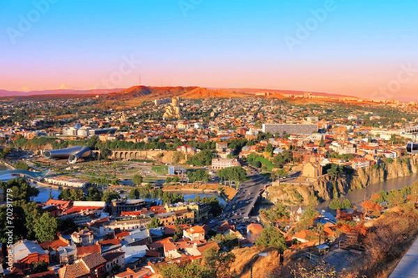 Fototapeta Beautiful panoramic view of Tbilisi at sunset