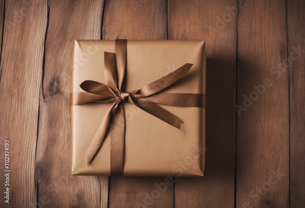 Fototapeta Package sitting on a wooden deck