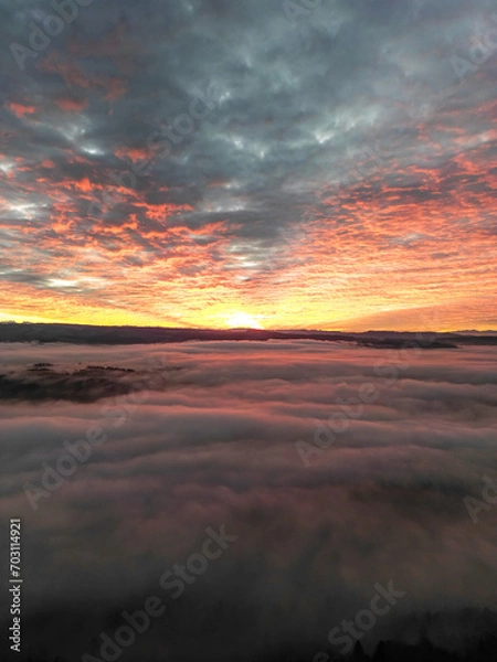 Obraz Beutiful sunset over the fog  