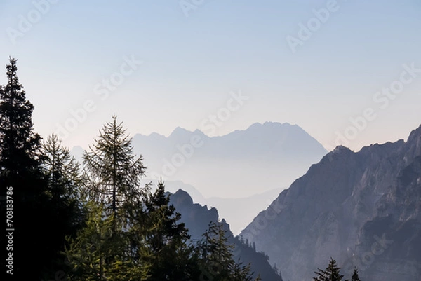 Fototapeta Scenic view of mountain peak Grintovec in majestic Kamnik-Savinja Alps, Slovenia, Europe. Magnificent Hiking trail on Loibl Pass in untamed Karawanks, Austrian border. Magical mountains Slovenian Alps