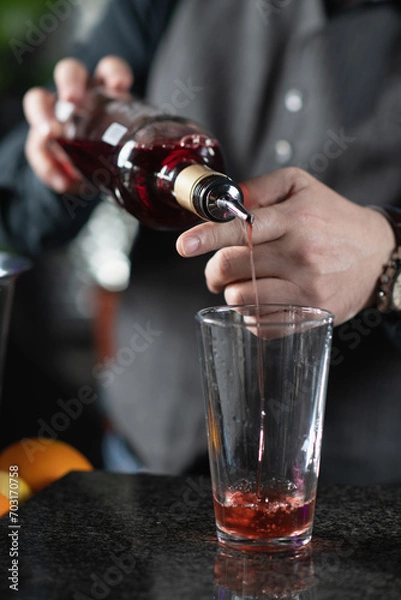 Fototapeta Bartender Preparing Negroni Cocktail.