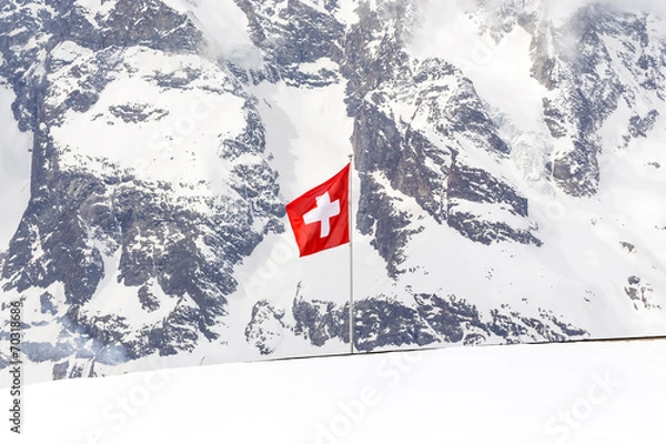 Fototapeta Switzerland flag over the Diavolezza Mountain