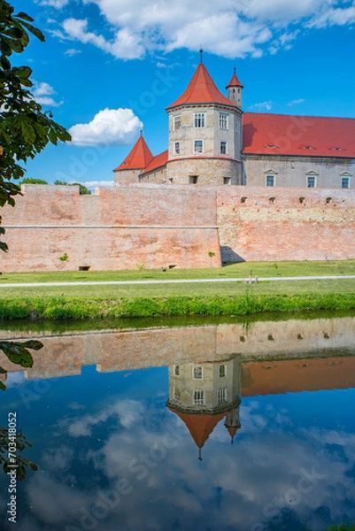 Fototapeta Summer scene with mirroring fortress