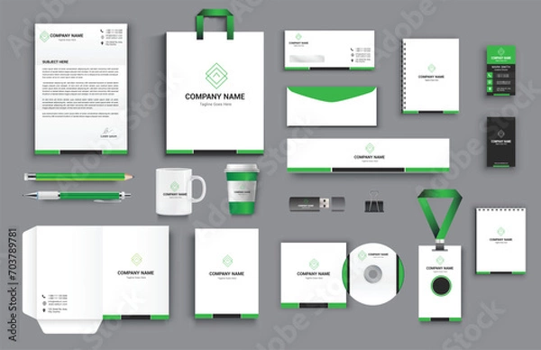 Fototapeta office business stationary set in green black white color vector design with letter head envelop folder id card notepad dvd cover usb paper clip pen pencil cups business card shopper