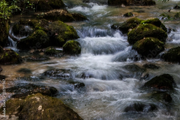 Fototapeta Landscape view of a waterfall stream in New Athos park.