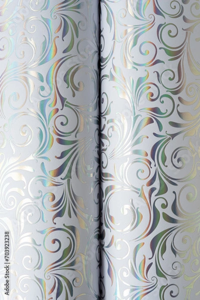 Fototapeta curled decorative iridescent scrapbooking paper with floral or decor pattern background