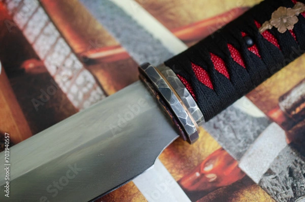 Fototapeta Red and black colure with tanto knife handle wraping