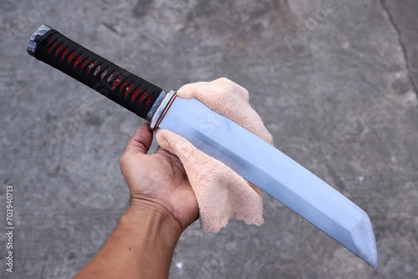 Fototapeta Red and black colure with tanto knife handle wraping