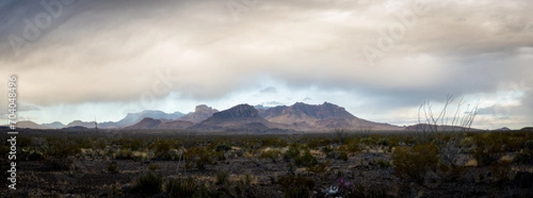 Fototapeta Rain Clouds Move Across The Chisos Mountain In Big Bend