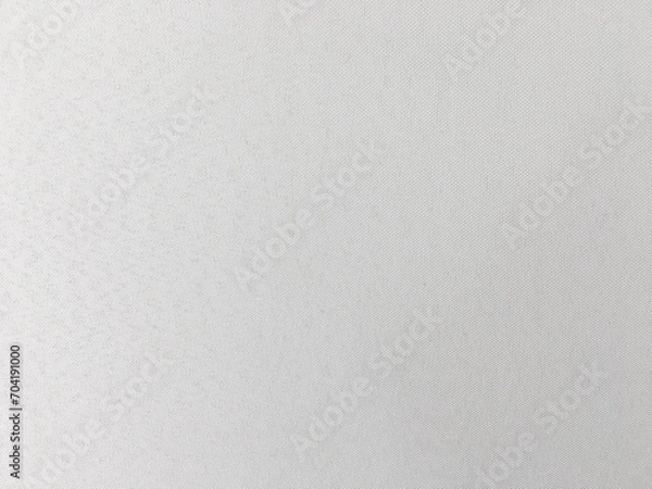 Fototapeta A clean and modern white wall, featuring a subtle gray pattern that adds a touch of sophistication to the overall design.