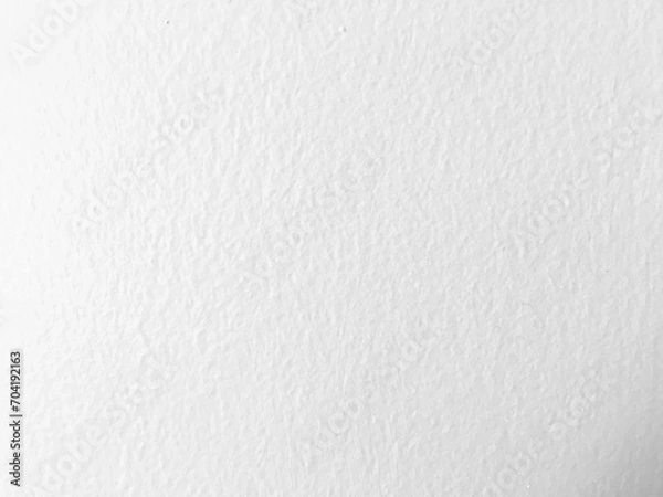 Fototapeta A clean and modern white wall, featuring a subtle gray pattern that adds a touch of sophistication to the overall design.