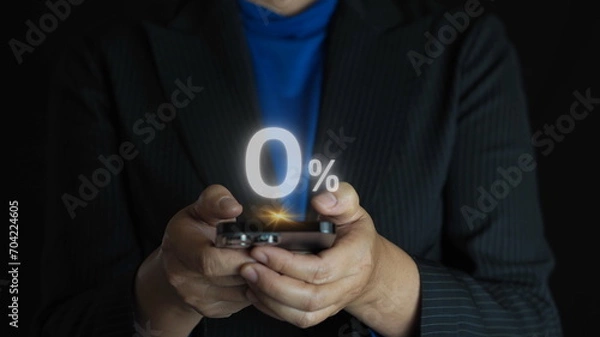 Fototapeta Businessman holding zero percentage on hand with copy space for sale discount promotion for Black Friday and merry Christmas happy new year period.