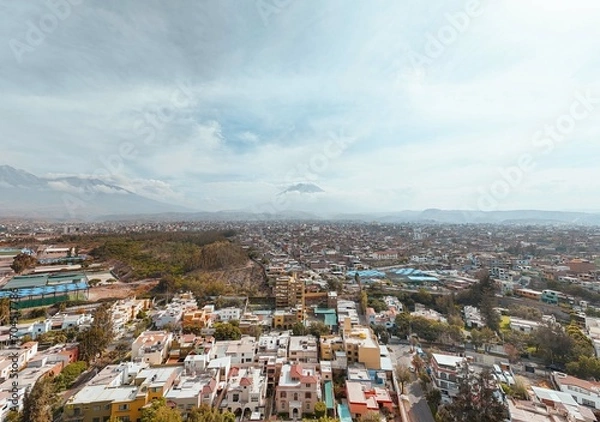 Obraz Ciudad rodeada de volcanes