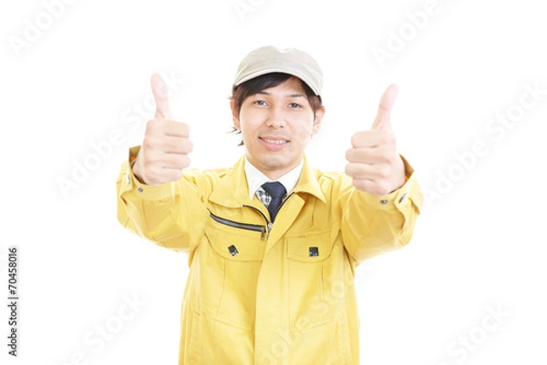 Fototapeta ガッツポーズの笑顔の男性