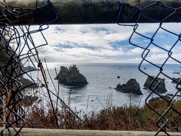 Obraz the wall, the clouds, and the ocean