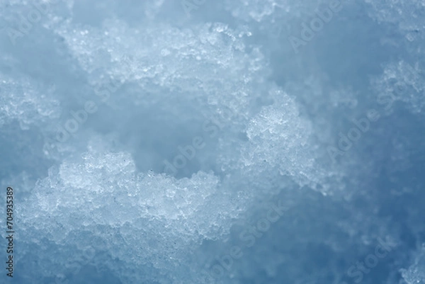 Fototapeta Macro photo of white snow in winter, snow texture.