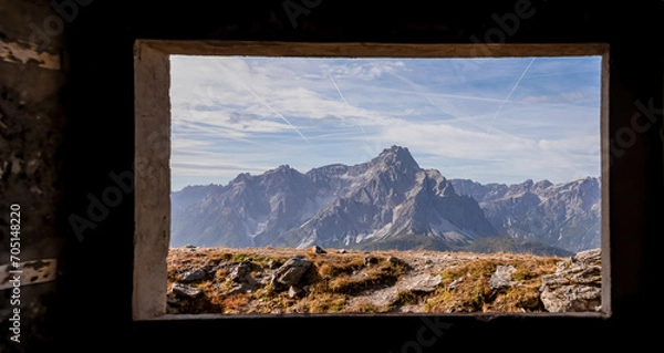 Fototapeta View from window of remains of military bunker First World War, mount Helm (Monte Elmo). Looking at summit Dreischusterspitze in mountain range of untamed Sexten Dolomites, South Tyrol, Italy, Europe