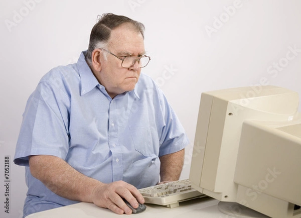 Fototapeta Old guy on computer