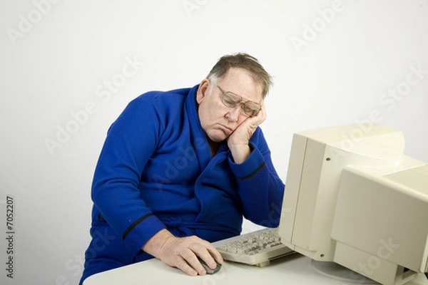 Fototapeta Big guy napping at the computer