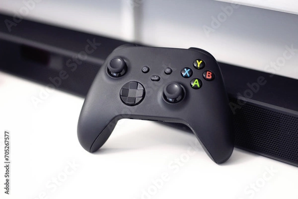 Fototapeta Generic game pad joystick on white background. Video games concept.