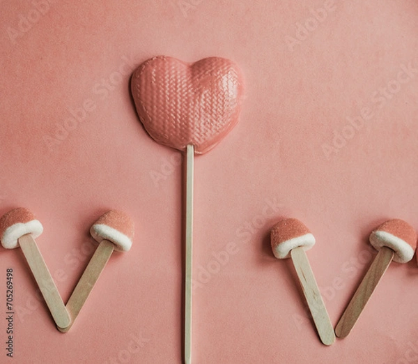 Obraz Four candy heart shape on peach fuzz background