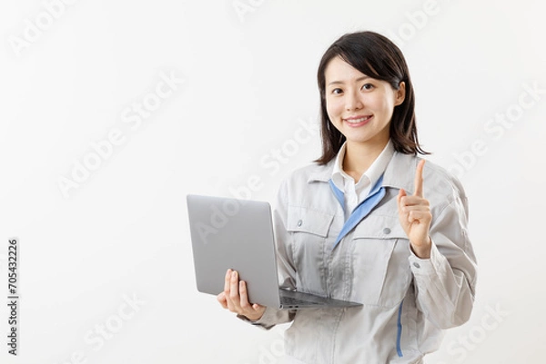 Fototapeta アドバイスをする作業服を着た女性01