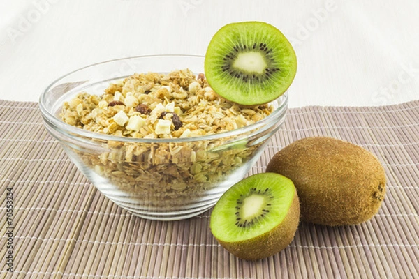 Fototapeta Cereal with kiwi on the mat