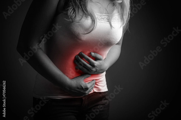 Obraz Lady abdominal pain. Black and white
