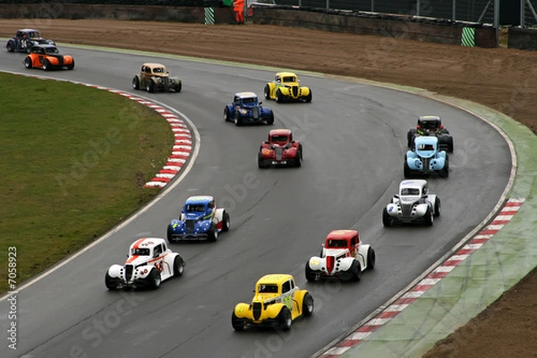 Fototapeta mini race cars on track that look like toy cars