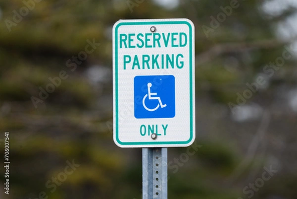 Obraz mounted sign sign says reserved parking for handicap only