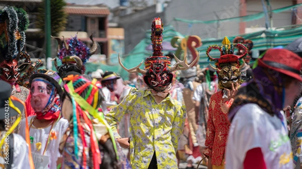 Obraz People with devil masks dancing at the Diablada Pillarena, a traditional festival of Ecuador