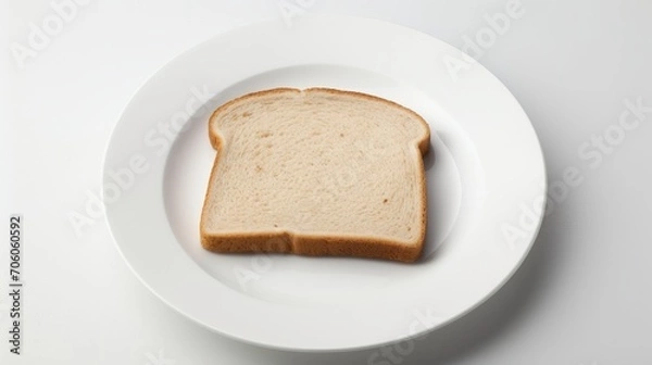 Obraz A single slice of bread on a spotless white plate  AI generated illustration