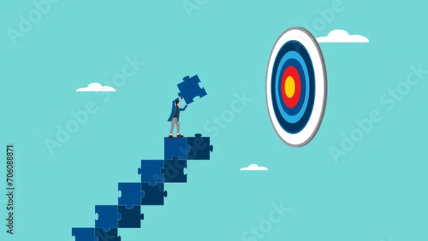 Fototapeta success step to achieve business goal, Business goals as profit target achievement process, the way to achieve goal, management or strategy to achieve target, businessman making ladder from puzzle