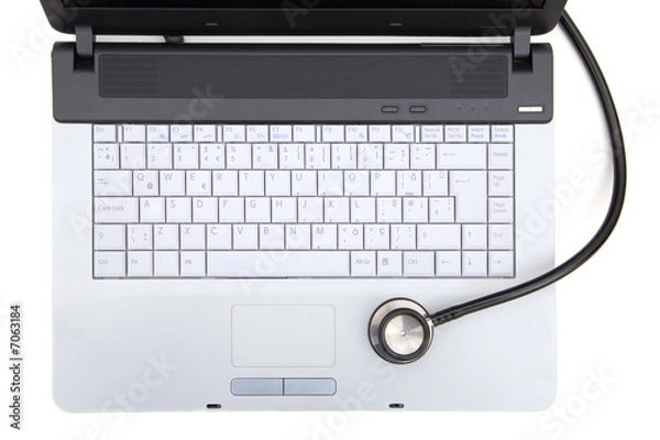 Fototapeta stethoscope on laptop